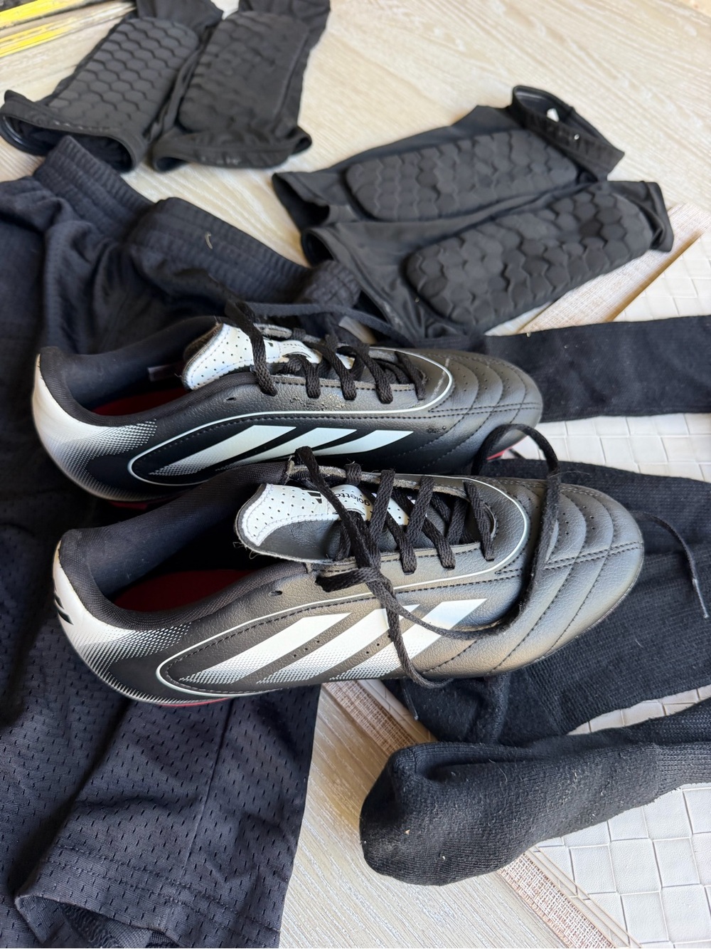 Black Men's Soccer Cleats with White Accents